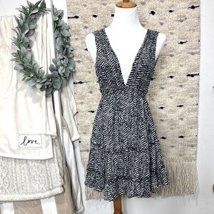 Neighbor by in the beginning Blue and white patterned deep V open back dress S